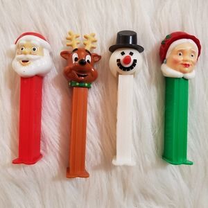 VTG Lot of 4 Christmas Pez Candy Dispensors Santa Mrs Claus Snowman Reindeer